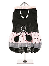 Midnight Stars Dress - Step out in style in this beautiful dress. Made from highest quality material with two tiers of delicate white chiffon skirting and one tier of pink satin printed with black stars finished with a black lace hem.  As a finishing touch a beautiful black satin bow surrounds the waist. The bow is tied w...