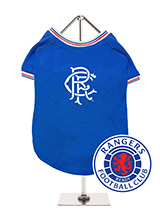 Rangers Football Team Shirt - Get 'Ready' to take a trip back to the future with our Rangers Retro Football Shirt. This retro-styled dog football shirt is based on Rangers kits of the past that have been worn by countless legends. It features red, white, and blue piping on the cuffs and collar and the club badge on the chest. Th...