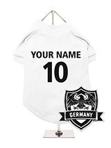 Germany Football Dog T-Shirt (Personalised) - Support Germany with this customisable dog t-shirt, featuring a unique Germany eagle crest. The t-shirt can be personalised with your dog's name and team number for a special touch. Crafted from comfortable, airy fabric, it keeps your dog comfortable and cool. It's easy to clean, being machine washa...