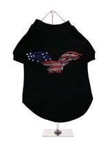 American Eagle GlamourGlitz Dog T-Shirt - Exclusive GlamourGlitz 100% Cotton Dog T-Shirt. Embellished with a soaring American Eagle, the National Emblem and crafted with Red, Silver and Blue Rhinestuds that catch a sparkle in the light. Wear on it's own or match with a GlamourGlitz ''Mommy and Me'' Women's T-Shirt to complete the look.