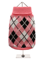 Pink & Black Argyle Sweater - Knitted pink sweater with a black and white diamond pattern. The Argyle pattern has seen a resurgence in popularity in the last few years due to its adoption by Stuart Stockdale in collections produced by luxury clothing manufacturer, Pringle of Scotland. The rich Scottish heritage will give your pu...