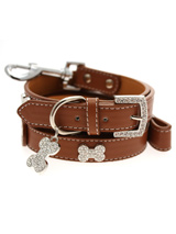 Brown Leather Diamante Collar / Diamante Bone Charm & Lead Set - Sparkling Bling Collar & Lead Set. This brown leather collar with a stitched edging has a crystal encrusted buckle with three large / bling sparkling diamante bones and a large sparkling diamante charm complete the look. A glamorous addition to the wardrobe of any trendy pooch. Matching lead has sil...